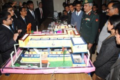 Students-briefing-the-Chief-Guest-Ad.-Gen.-N.S.Nehra-in-the-Physics-exhibition