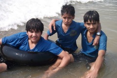Students-enjoying-waves-at-the-sea-beach-in-Jagannath-Puri